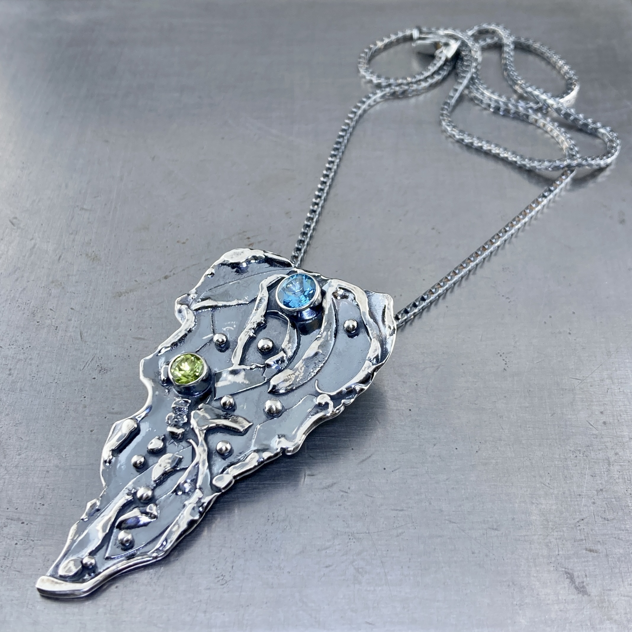 Swiss topaz, peridot pendant - antique Argentium silver waves