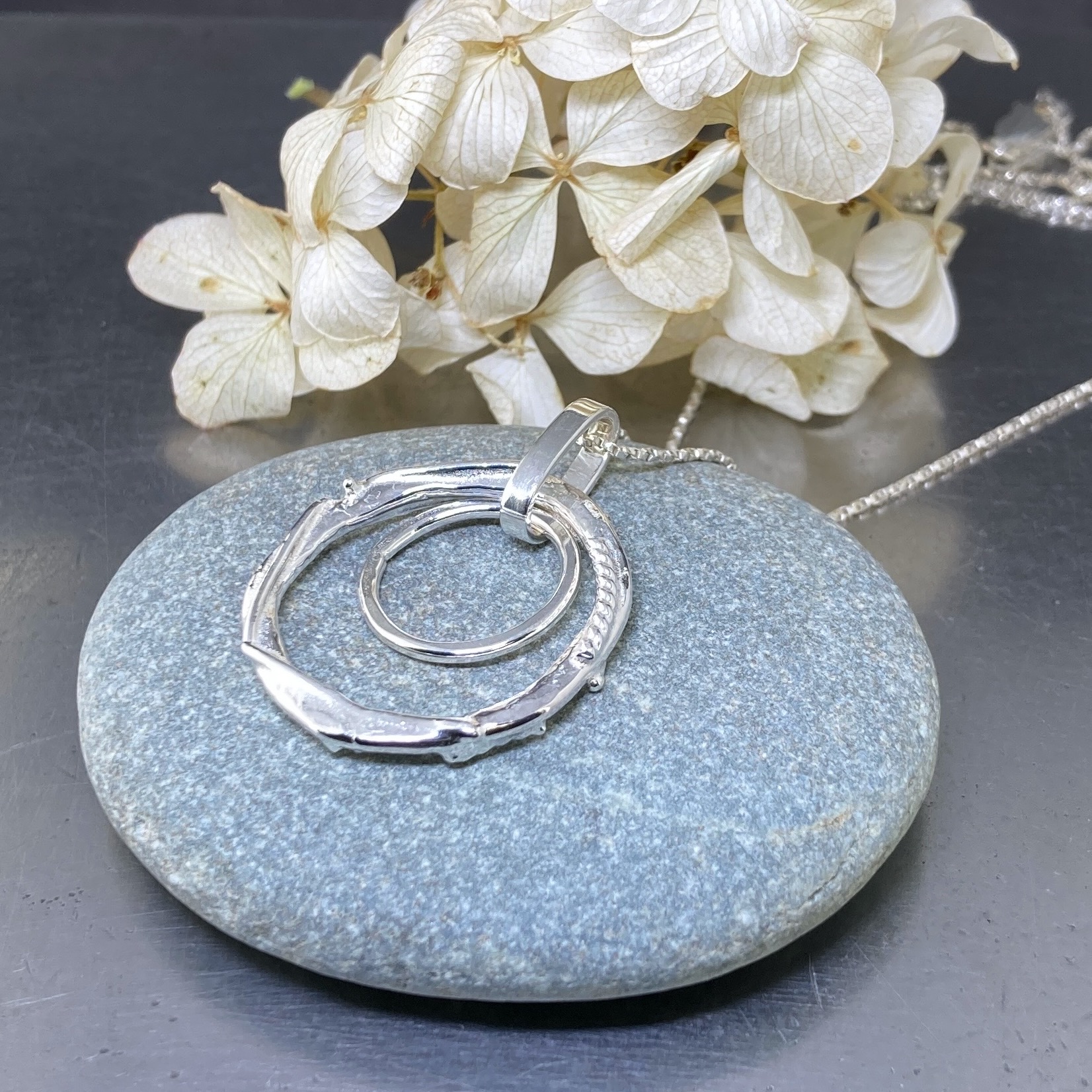 freeform circle pendant – double hollow boulder
