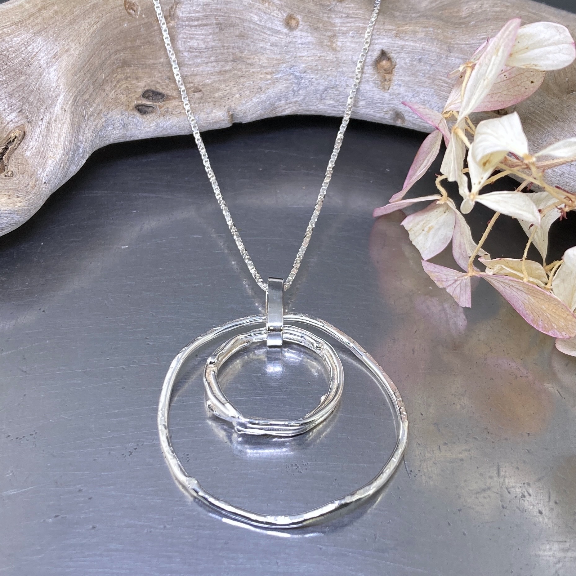 freeform circle pendant – double hollow boulder - Argentium silver