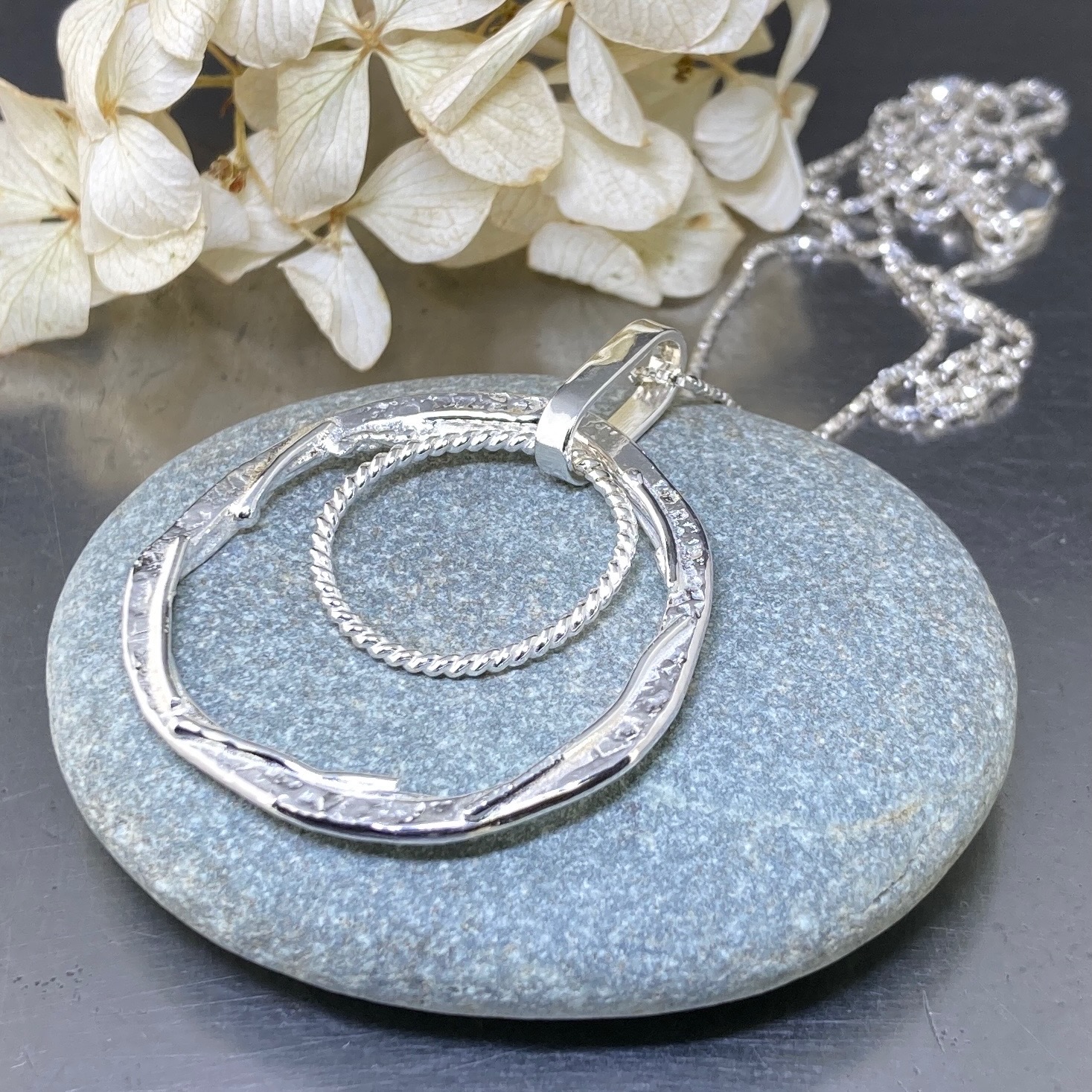 freeform circle pendant – double hollow boulder - Argentium silver