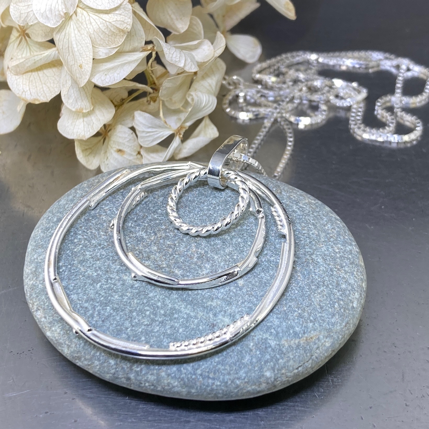 freeform circle pendant – triple hollow boulder - Argentium silver