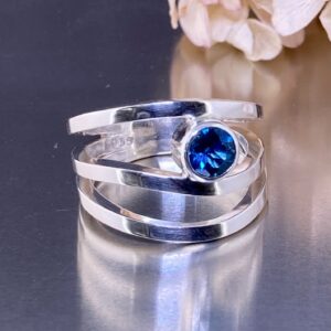 Swiss Topaz Ring – Size 8.25 – Wind Design – 0.5 Carat